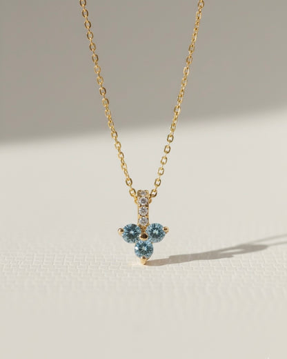 colgante azul oro brillantes