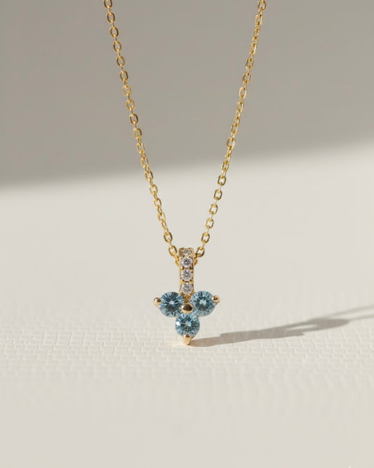 colgante azul oro brillantes